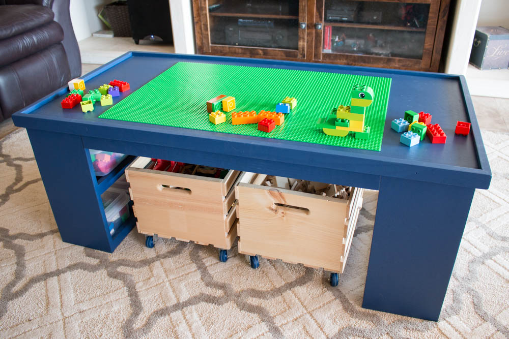 This table is perfect for keeping the kids entertained!  It can be used as a train table, a Lego table, drawing, and more!  It is the perfect DIY gift idea for Christmas!