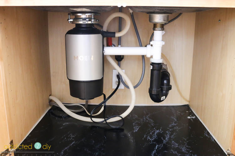 how to replace garbage disposal moen