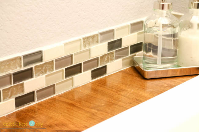 mosaic tile backsplash in bathroom