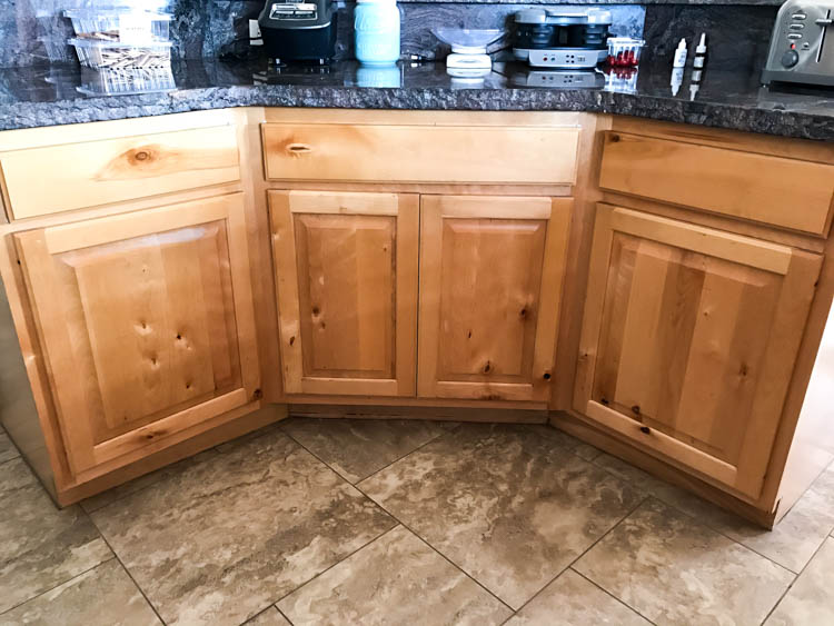 painting knotty pine wall before and after kitchen