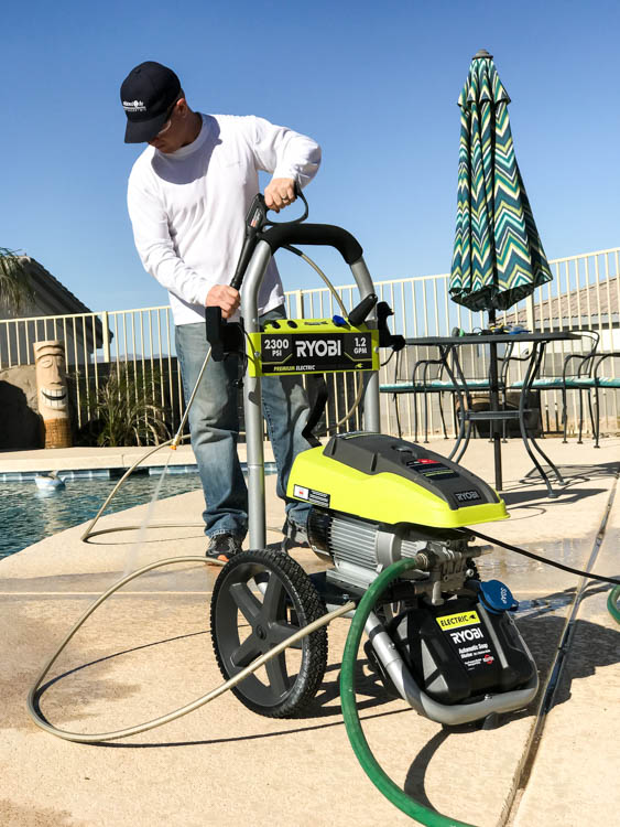 cleaning the pool deck