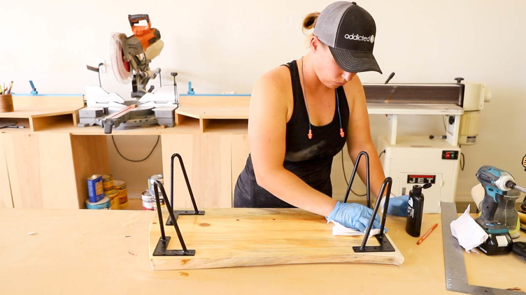 applying finish to bottom of lap desk