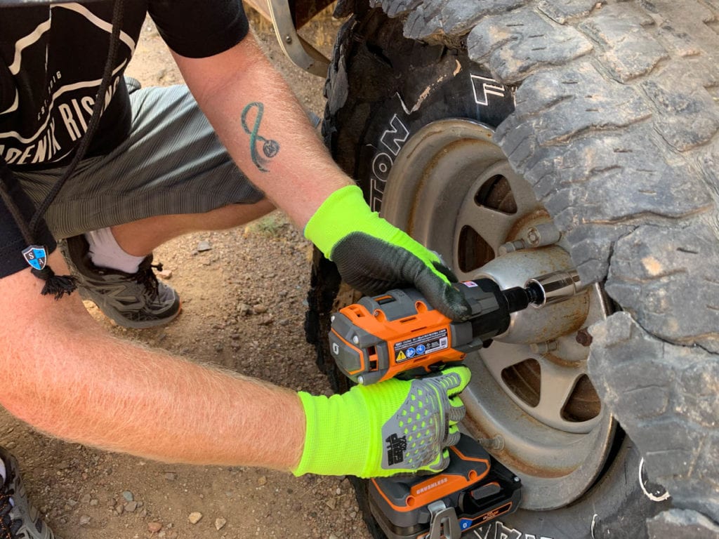 Loosening lug nuts with impact wrench