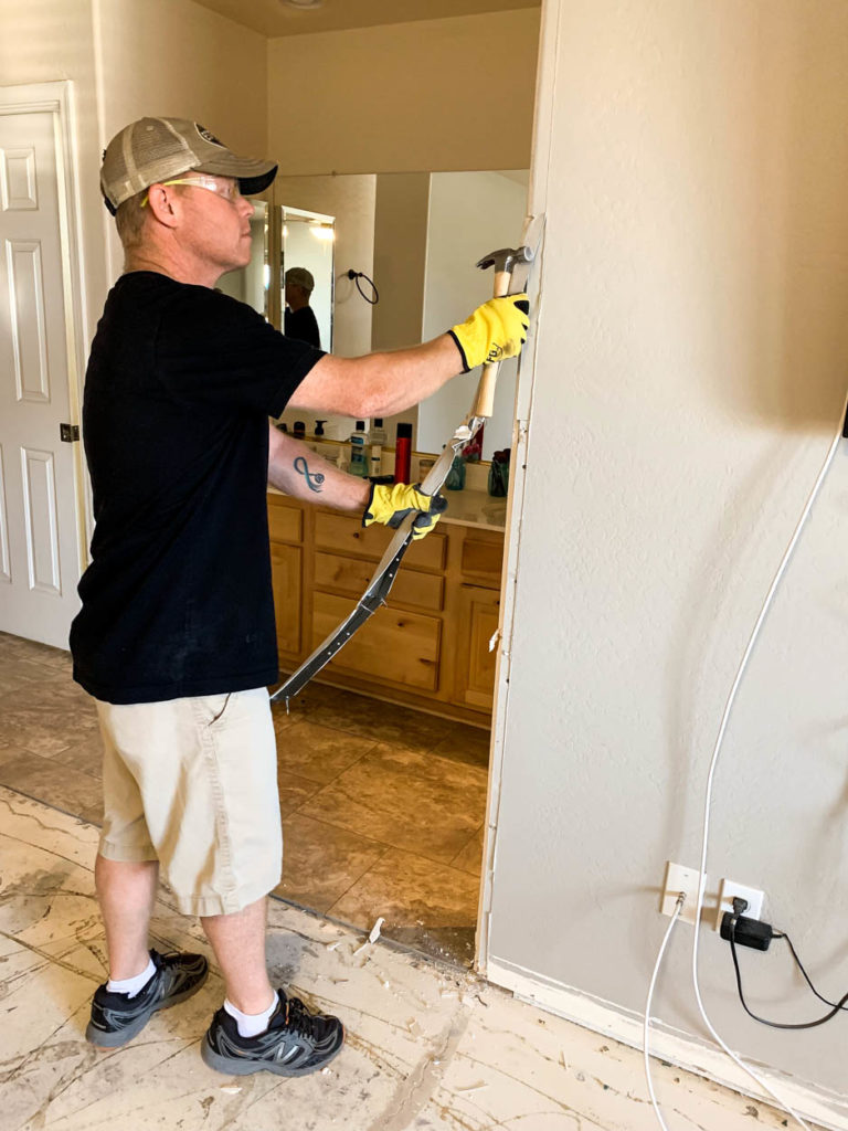 demoing wall in bathroom