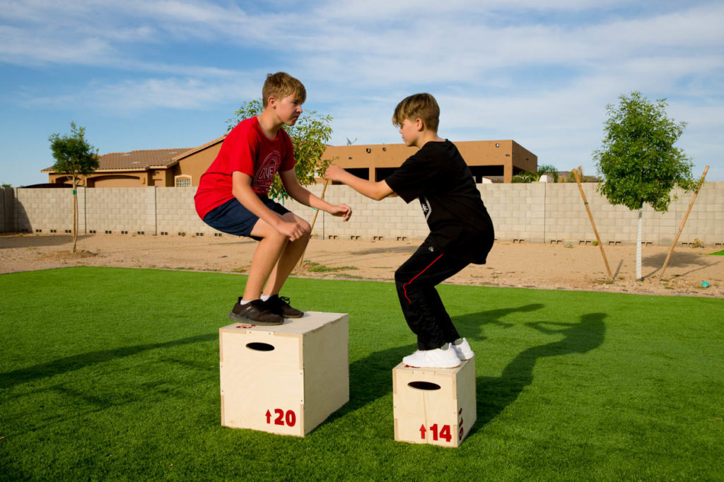 jumping on plyometric box