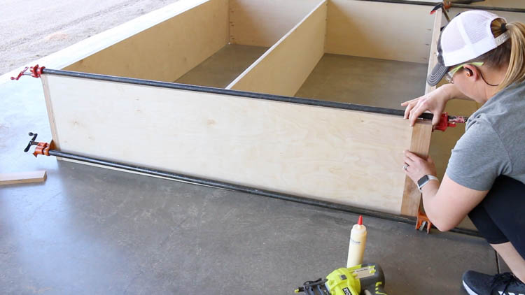 Adding trim to the footboard while building a DIY queen size storage bed