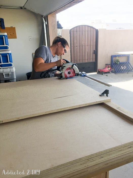 Cutting plywood with circular saw for DIY Murphy bed construction
