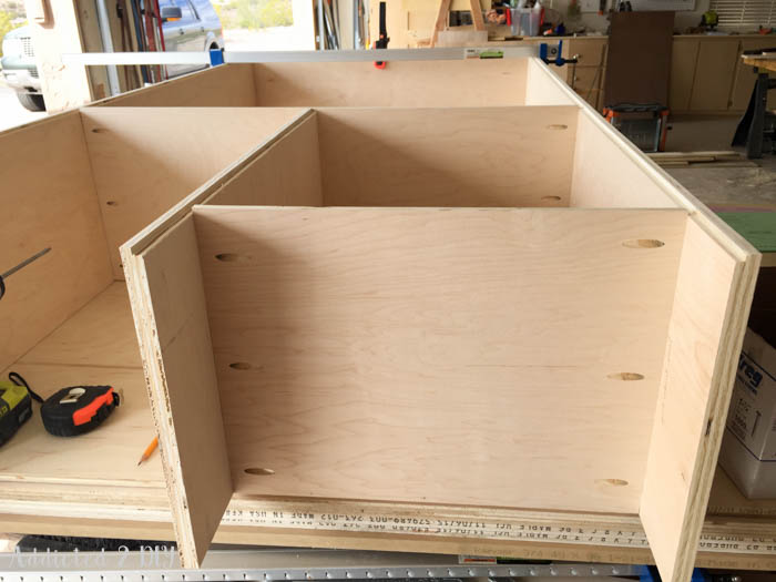 Cabinet frame with divider panels installed