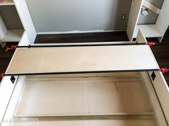 Clamping Murphy bed frame components together during assembly process