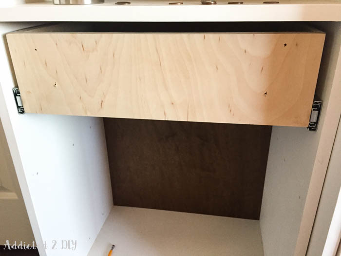 Drawer installed with side mount slides