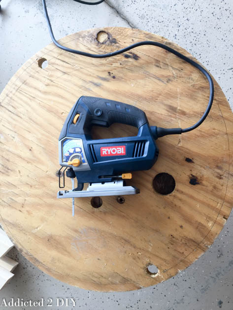 Tracing and cutting a round wood base for a DIY tire planter