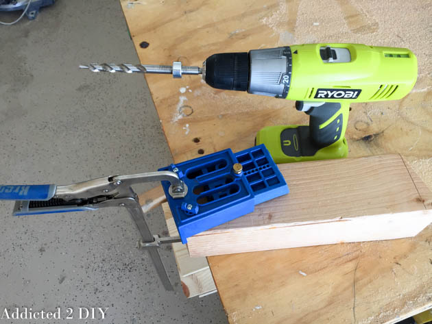 Drilling pocket holes into wood legs for the DIY tire planter stand