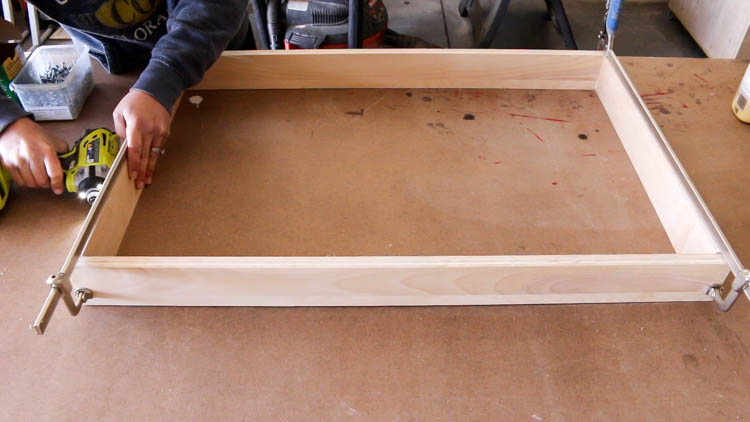 Building pull-out shelves for DIY miter saw bench cabinets using pocket screws and clamps