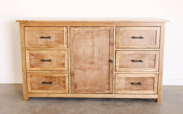 Front view of DIY rustic dresser with six deep drawers, center cabinet, and Liberty soft iron bar pulls