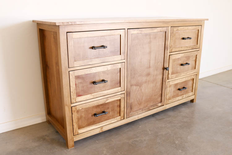 poplar dresser with six drawers, center cabinet door, and black iron hardware — angled view