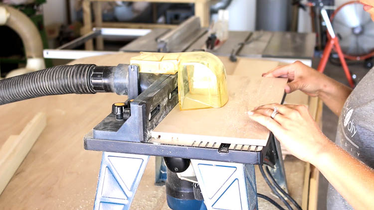 Routing dados into drawer front frame pieces on a router table using an undersized straight bit