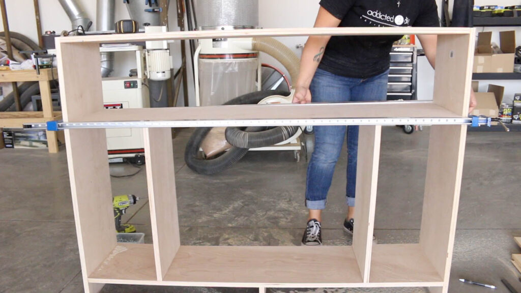 clamping the carcass of the fireplace together for assembly