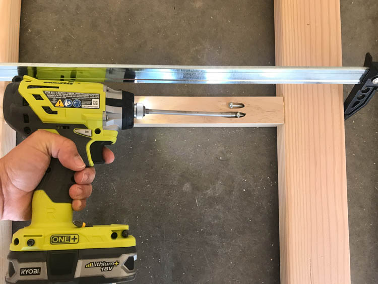 Driving pocket hole screws into 2x4 frame using Ryobi drill and Kreg jig