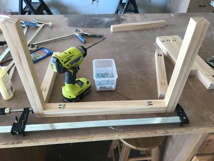 Attaching bench frame pieces to back frame with pocket screws and wood glue