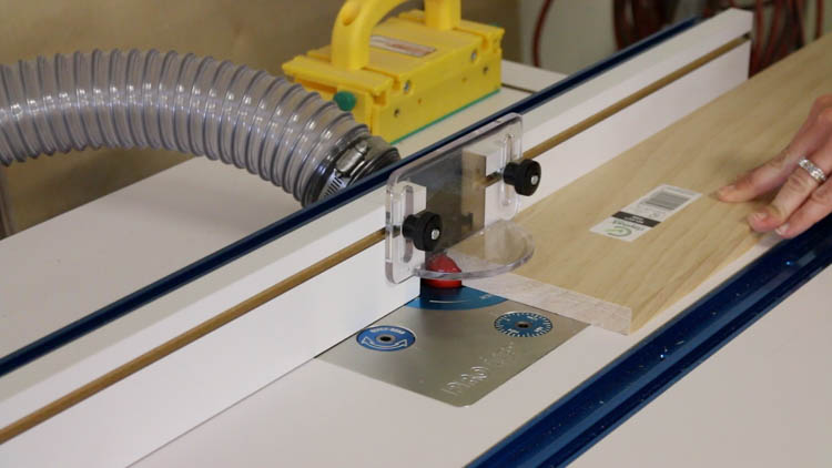 Adding a cove profile to pine board moulding using a router table for a DIY printer cabinet base