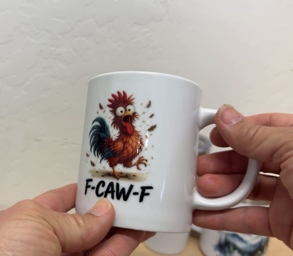 A coffee mug with a UV printed DTF sticker adhered to it