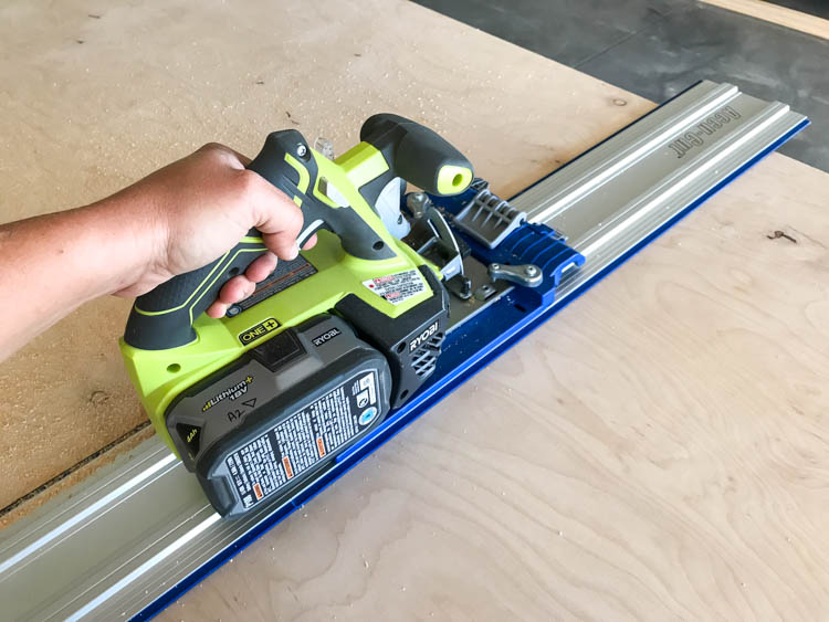 Cutting plywood sheets with a track saw for a DIY nightstand with a faux floating top