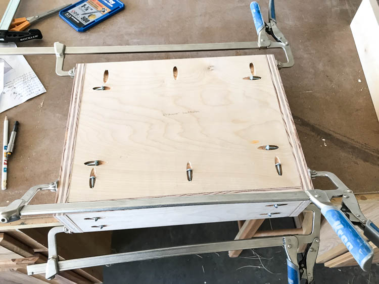 Clamping the nightstand drawer box during assembly