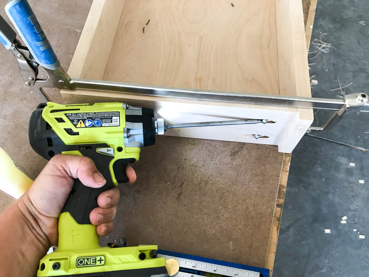 Securing the drawer side panels together with pocket hole screws