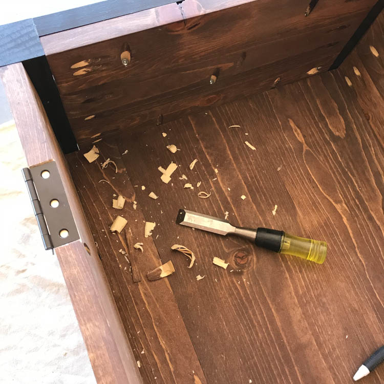 Chisel used to mortise hinges into storage bench for flush lid installation