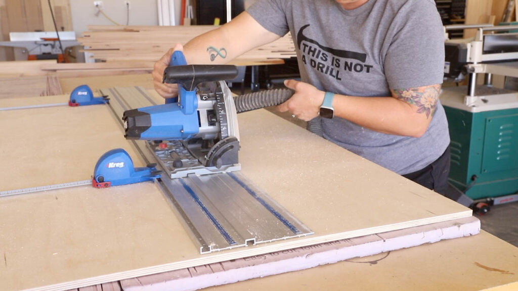 Using the Kreg Adaptive Cutting System with parallel guides to cut a sheet of Baltic birch plywood for DIY cornhole boards