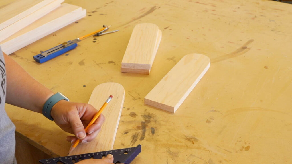 Marking angle cuts on the bottom of cornhole board legs so they sit flat on the ground when folded out