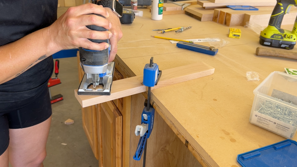 cutting cove brackets in a board with a jigsaw